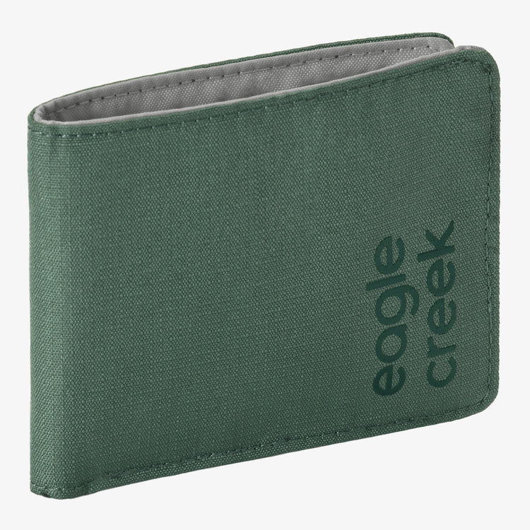A green canvas bifold wallet with the 'eagle creek' brand name printed vertically on the front, shown against a plain white background.